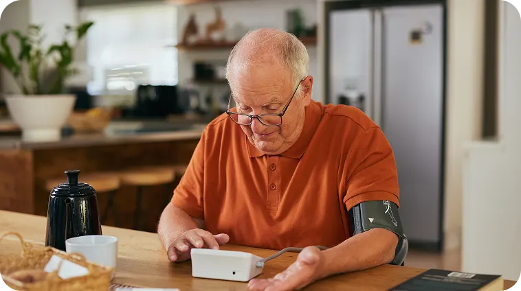 senior-man-checking-blood-pressure-at-home